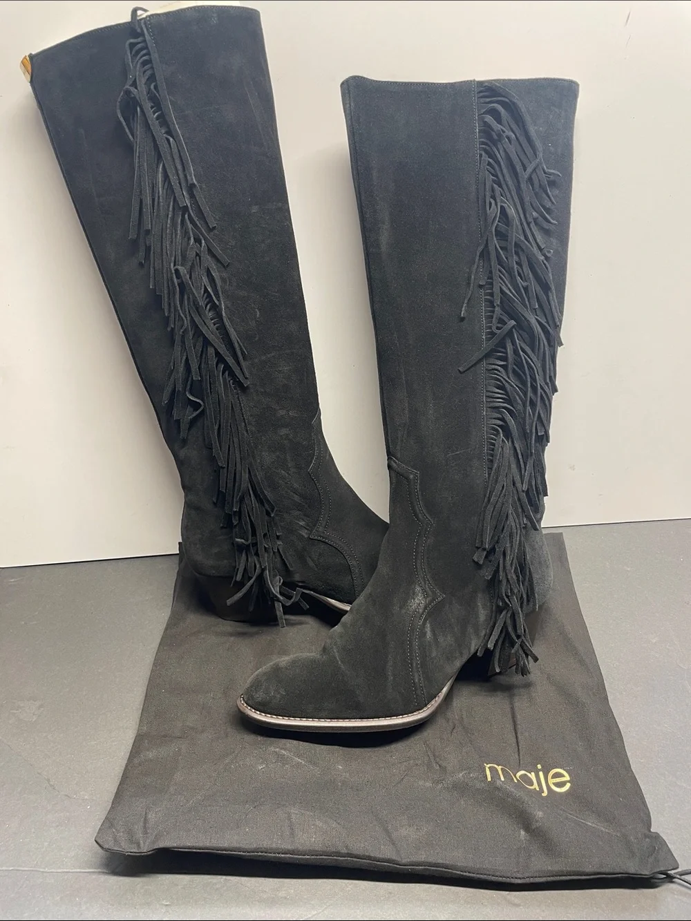 Fringed suede cowboy boots